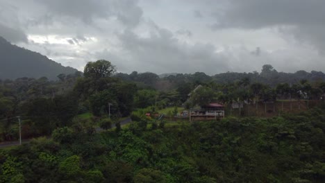 beautiful-aerial-view-with-drone-of-flying-in-the-rain-in-the-jungle-of-Ixhuatlan-del-café,-Veracruz,-Mexico