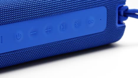 Close-up-Footage-Of-Blue-Portable-Speaker-Isolated-On-White-Background