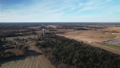 Aerial-approach-of-water-tower-with-blue-skies