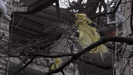 Tarpaulins-stuck-in-a-tree-flutter-in-the-wind-in-front-of-the-damaged-offices-of-Russian-installed-deputy-leader-of-Kherson-Kirill-Stremousov-following-September’s-targeted-HIMARS-missile-attack