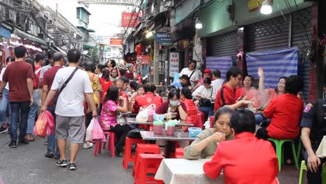 Over-Crowded-Street,-Festivities-Celebrating-Chinese-New-Year,-Bangkok