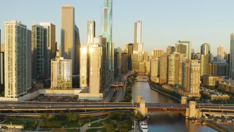 Aerial-tracking-shot-of-Chicago's-Lakeshore-Drive-with-Trump-Tower-and-skyline-in-background