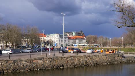Basargatan-street-in-front-of-city-moat,-Gothenburg,-Sweden,-wide-shot-pan-right