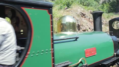 Linda---Blanche-narrow-gauge-steam-trains-built-1893-pull-into-Tan-y-bwlch-station,-Ffestiniog-Railway,-Snowdonia,-Wales---close-up,-4K-23