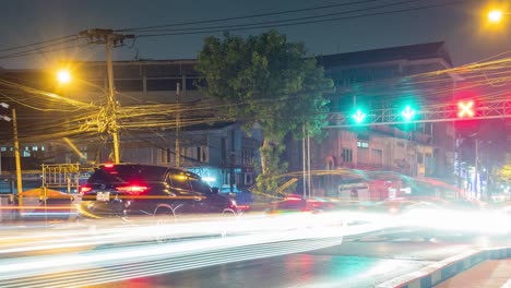 TIME-LAPSE-Cars-Moving-Through-A-Bangkok-Intersection-At-Night