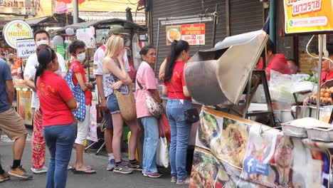 People-Waiting-For-Asian-Street-Food-During-Chinese-New-Year-Celebrations