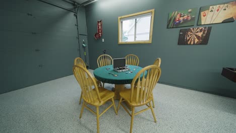 poker-table-set-up-in-the-game-room-garage-of-a-large-home