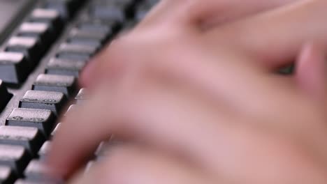 Extreme-close-up-on-the-computer-keyboard-while-typing-on-it