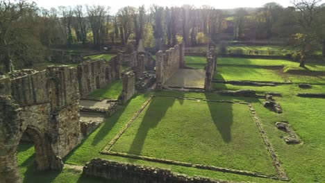 Basingwerk-abbey-landmark-medieval-abandoned-Welsh-ruins-Aerial-view-close-flyover