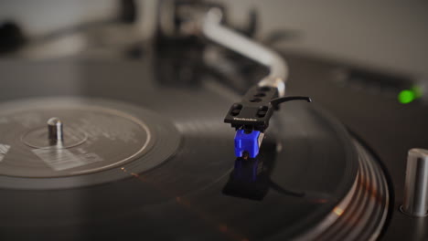 The-legendary-Technics-SL1200-MK2-turntable-is-playing-a-record-with-a-Jive-label
