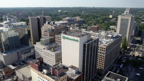 Aerial-view-around-buildings-in-downtown-Wilmington-city,-in-sunny-Delaware,-USA---circling,-drone-shot