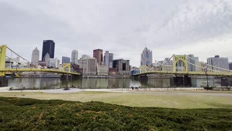 Pittsburgh-downtown-skyline-panorama-viewed-from-Allegheny-Landing,-between-Roberto-Clemente-and-Andy-Warhol-bridges