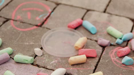many-colored-chalks-of-different-lengths-scattered-on-the-ground