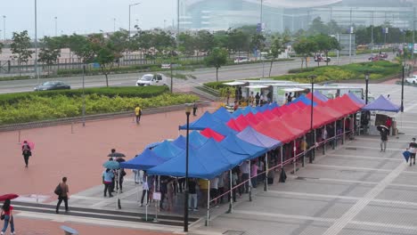 Citizens-queue-in-line-to-receive-mass-PCR-tests-for-coronavirus-from-Community-Testing-Centre-trucks-to-tackle-the-spread-of-the-virus-and-the-pandemic-in-Hong-Kong