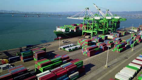 Aerial-drone-view-of-colorful-cargo-crates-and-cranes-at-a-Shipping-port-in-San-Diego,-USA