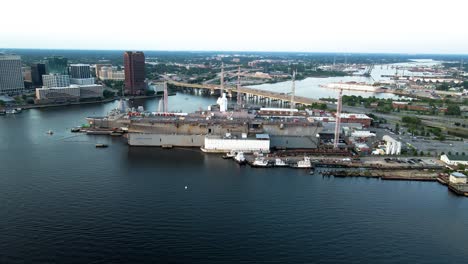 Aerial-View-Of-General-Dynamics-Nassco-Shipyard-With-Berkeley-Bridge-In-Background