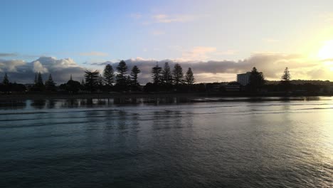 Waves-rolling-in-at-golden-hour-in-Orewa