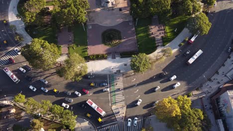 Tilt-down-aerial-of-busy-roundabout-in-Buenos-Aires