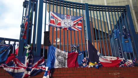 Close-up-of-flags-on-the-Rangers-FC-main-gate-at-Ibrox