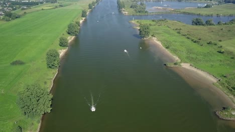 Aerial-drone-view-of-Meuse-river-in-the-Netherlands,-Europe