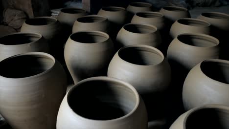 Freshly-molded-handmade-clay-vessels-at-the-potters-workshop