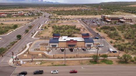 Aerial-view-of-Mister-Car-Wash,-commercial-car-cleaning-facility-in-Sahuarita,-Arizona