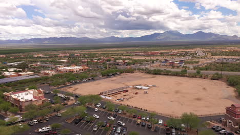 Shopping-mall-and-construction-zone-in-Sahuarita,-Arizona,-drone-pullback