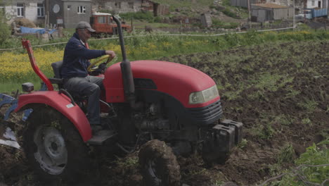 Man-In-A-Farm-Plowing-Fields-In-Summer-At-Moliti-Village-In-Georgia