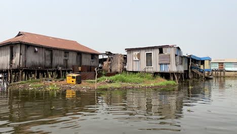 Wooden-Houses-On-Stilts-Over-The-Lake-Nokoue-In-Ganvie,-Benin,-Africa-Seen-From-The-Boat