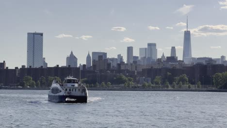New-York-public-transport-ferry-on-the-Hudson-river-in-front-of-the-One-World-Trade-center-building