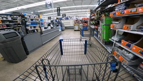 POV-while-pushing-a-cart-through-Walmart-in-the-sporting-goods