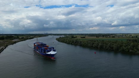 Aerial-View-Of-BG-Onyx-Cargo-Container-Ship-Approaching-Along-Oude-Maas-Through-Zwijndrecht