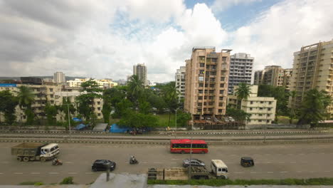 beautiful-weather-with-city-view-from-metro-train-top-birds-eye-view-tracking-shot-India-Mumbai-Maharashtra