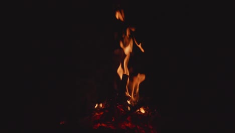 Bonfire-smolders-Outdoors