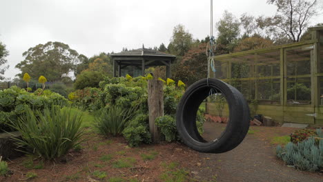 Rural-Property-With-Tyre-Swing-And-Hen-House,-SLOW-MOTION