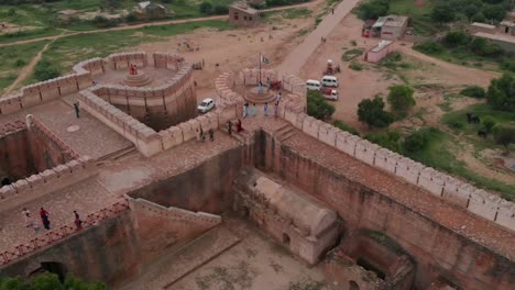 Drone-takes-an-aerial-shot-of-the-Umerkot-Fort-where-people-are-seen-admiring-the-architectural-grandeur-of-the-fort
