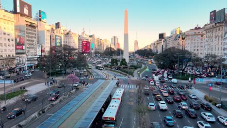 Aerial-view---traffic-flow-along-the-widest-avenue-in-the-world,-Buenos-Aires