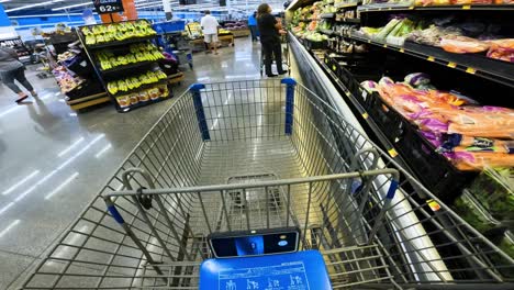 POV-while-pushing-a-cart-thru-the-produce-section-and-out-of-Walmart