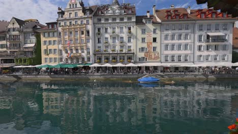 Panning-view-of-waterfront-buildings-in-Lucerne-Switzerland