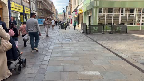 Pedestrians-walk-down-Whitefriargate-in-the-City-of-Kingston-Upon-Hull