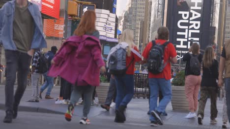 Slow-Motion-TImes-Square-lady-taking-off-jacket