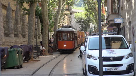Old-vintage-and-famous-tram-on-the-rail-on-streets-in-the-summer