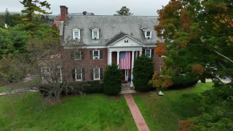 Aerial-footage-of-brick-fraternity-house-on-an-overcast-fall-day