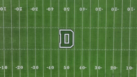 Rising-aerial-shot-of-Dartmouth-College-football-field-and-track