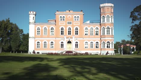 18-September-2022,-Latvia:-Birinu-Palace,-Latvian-Castle-by-Lake-With-Nice-Garden