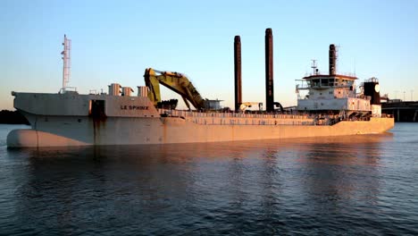 Split-Hopper-Barge-used-for-dredging-in-port-of-Launceston,-Australia