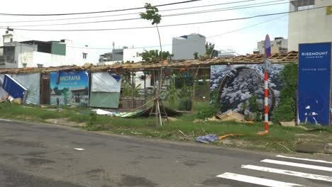 Damage-From-Tropical-Storm-Noru,-Destroyed-Shops-by-Street-in-Da-Nang,-Vietnam