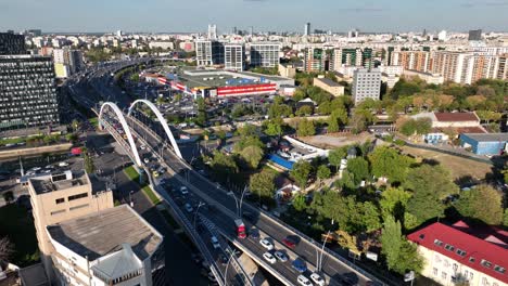 Aerial-drone-shot-of-traffic-jam-on-road-in-central-Bucharest-during-sunny-day,-Romania