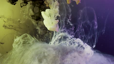 Slow-motion-shot-of-falling-paint-ink-underwater,magical-effect-and-illusion