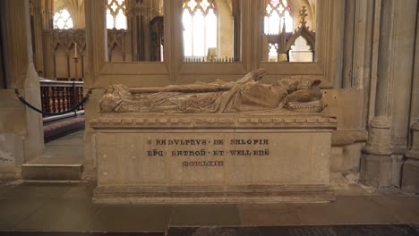 One-of-the-vandalised-effigies-of-the-Saxon-bishops-of-the-wells-cathedral,-camera-moving-towards-the-vandalised-effigy